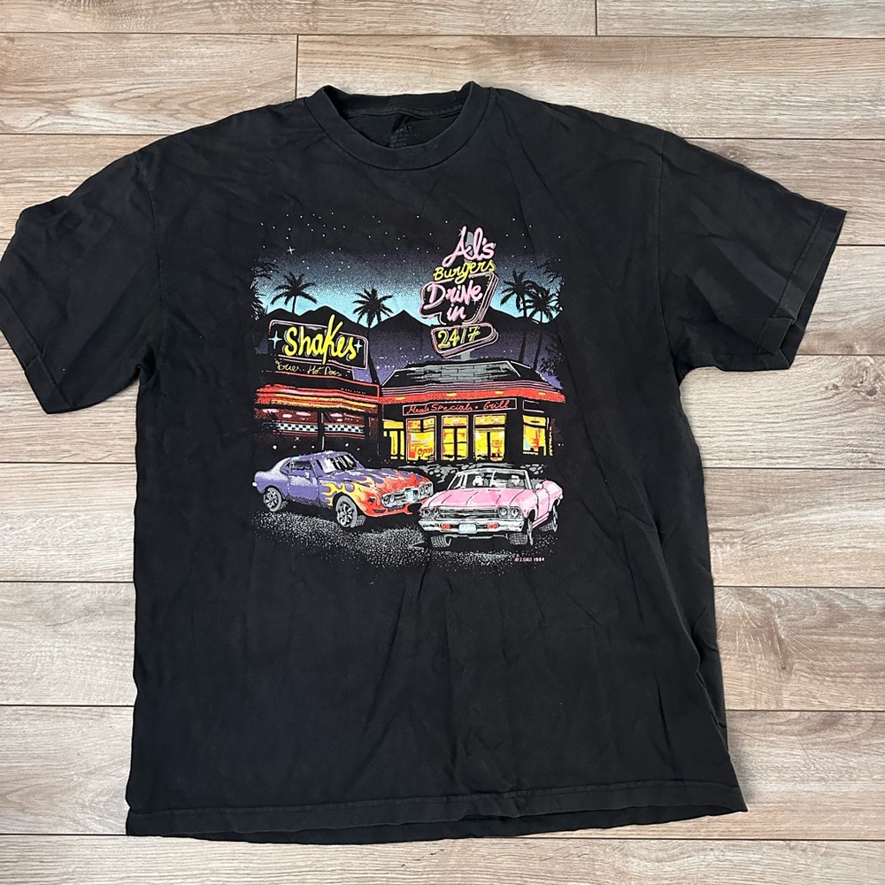 Retro Black Graphic Tee with Neon Design